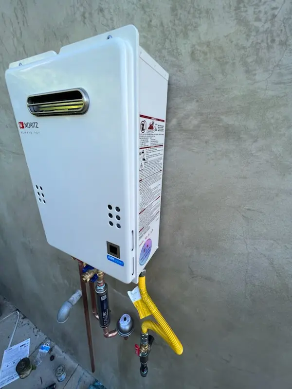 Tankless water heater installation for Village homes